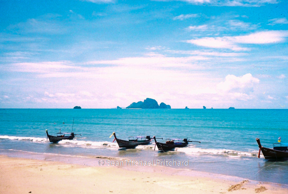 thai longtails beach tropical