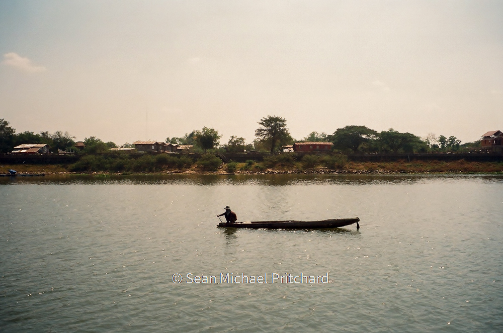35mm film boat fishing river