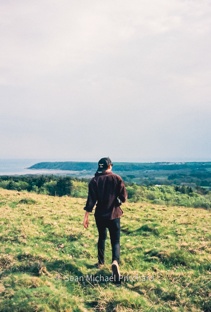 coastal walking person photo film