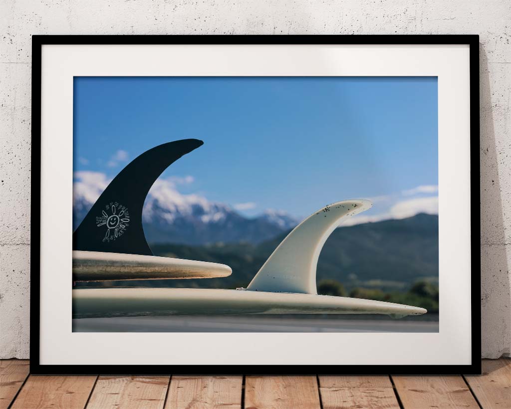 framed photography of two surfboards
