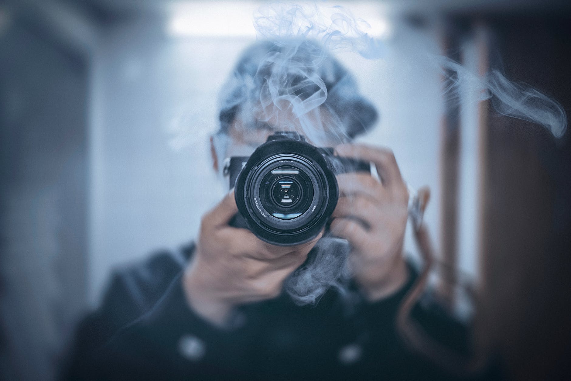 photographer with camera in hands